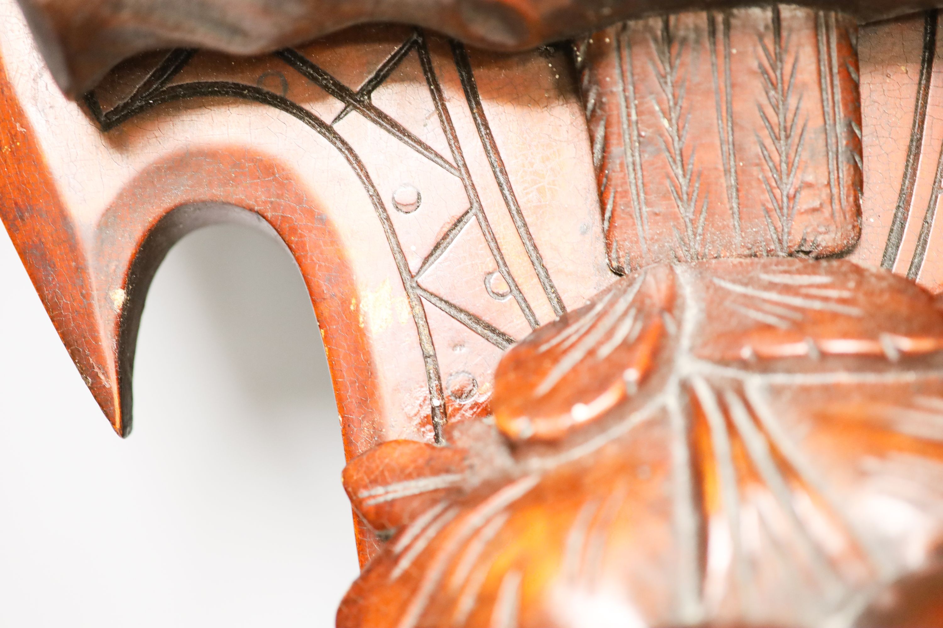 A late 19th century carved mahogany ‘eagle’ wall bracket with glass eyes 51cm